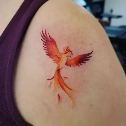 Orange Ink Phoenix Bird Tattoo