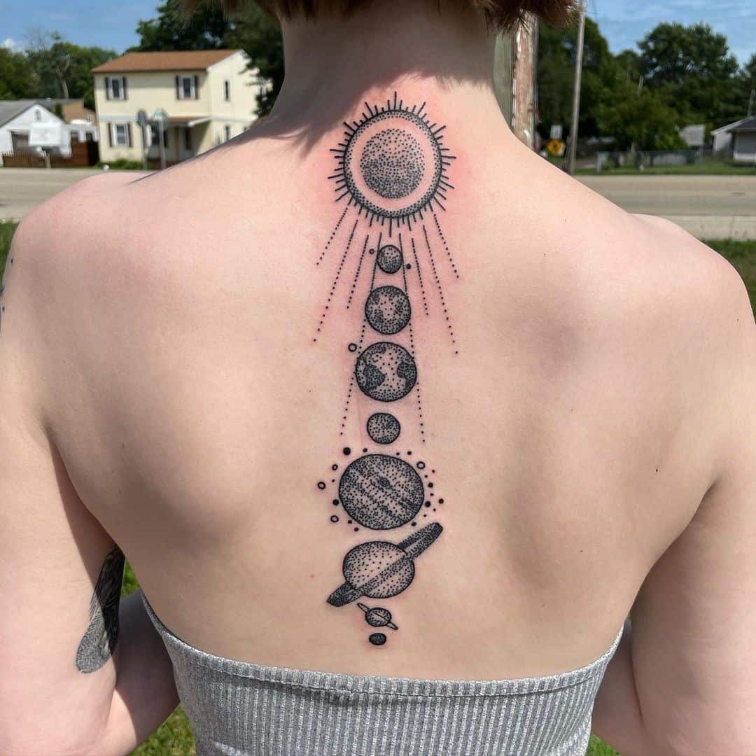 Planet Inspired Spine Tattoos