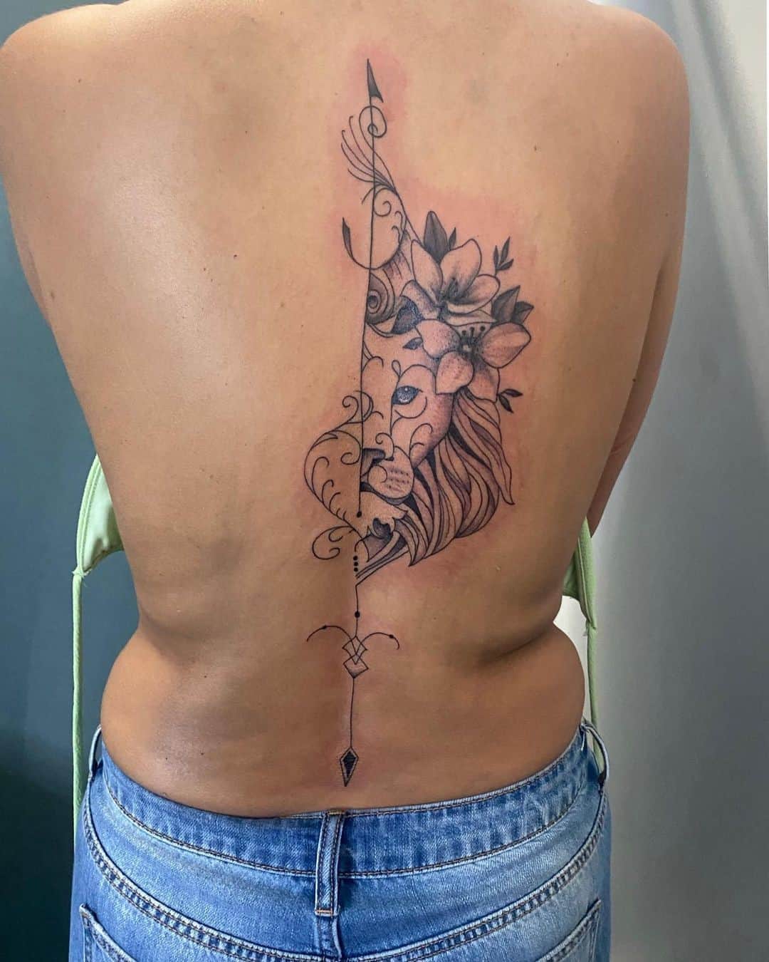 Spine Tattoo Ideas Lion Print