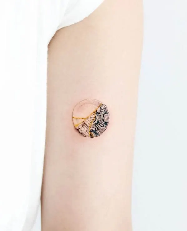 Tiny kintsugi plate tattoo by @studio__berry