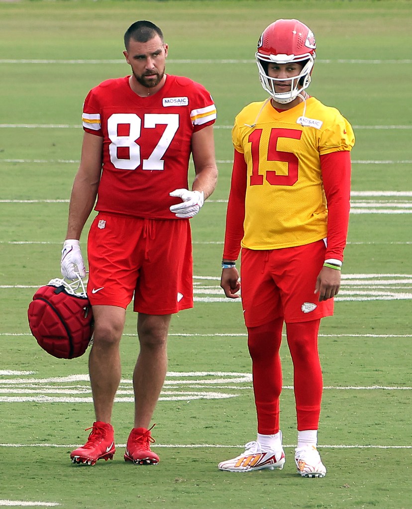 Patrick Mahomes #15 of the Kansas City Chiefs stands with tight end Travis Kelce #87 during Kansas City Chiefs Training Camp on July 25, 2023 in St Joseph, Missouri.