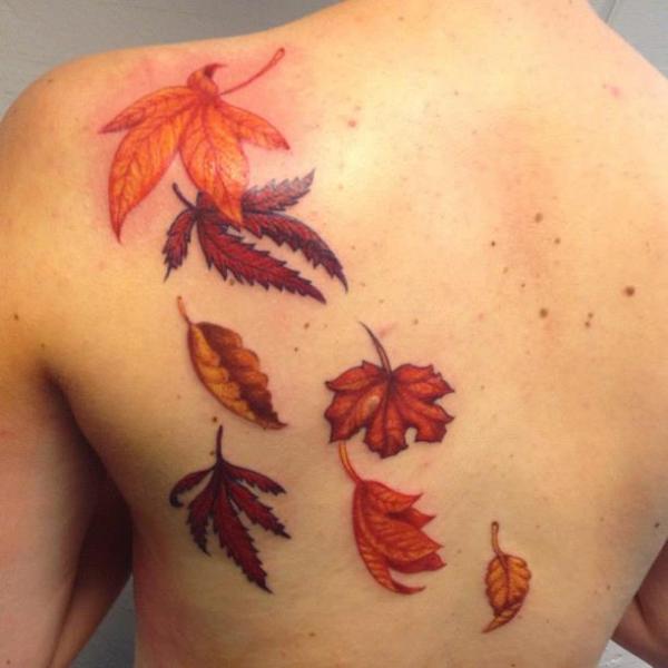 Falling leaves back tattoo