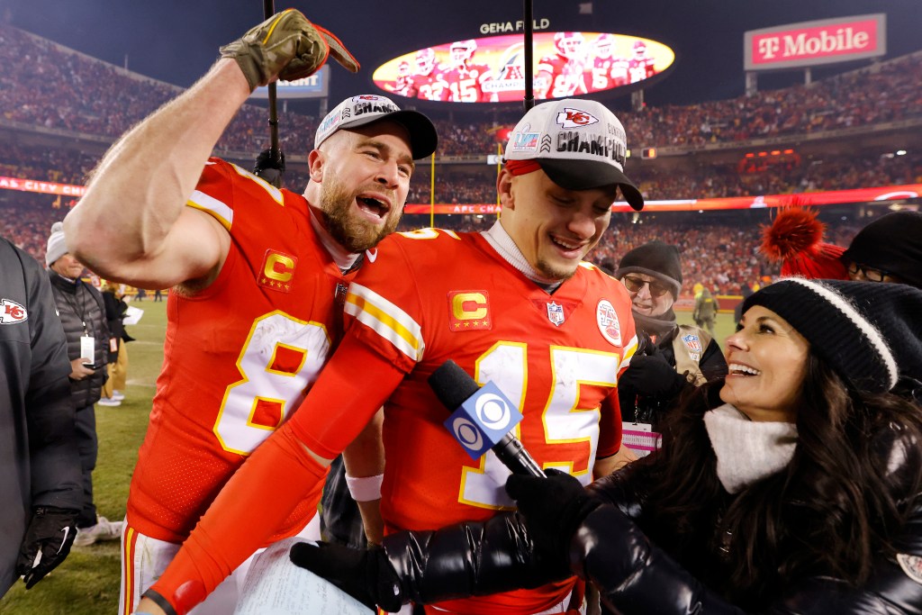 Travis Kelce #87 and Patrick Mahomes #15 of the Kansas City Chiefs celebrate after defeating the Cincinnati Bengals 23-20 in the AFC Championship Game at GEHA Field at Arrowhead Stadium on January 29, 2023 in Kansas City, Missouri.