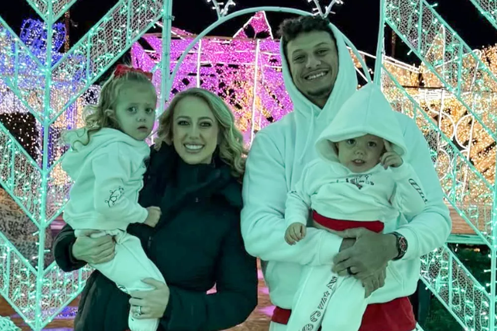 Brittany and Patrick Mahomes ice skating their kids