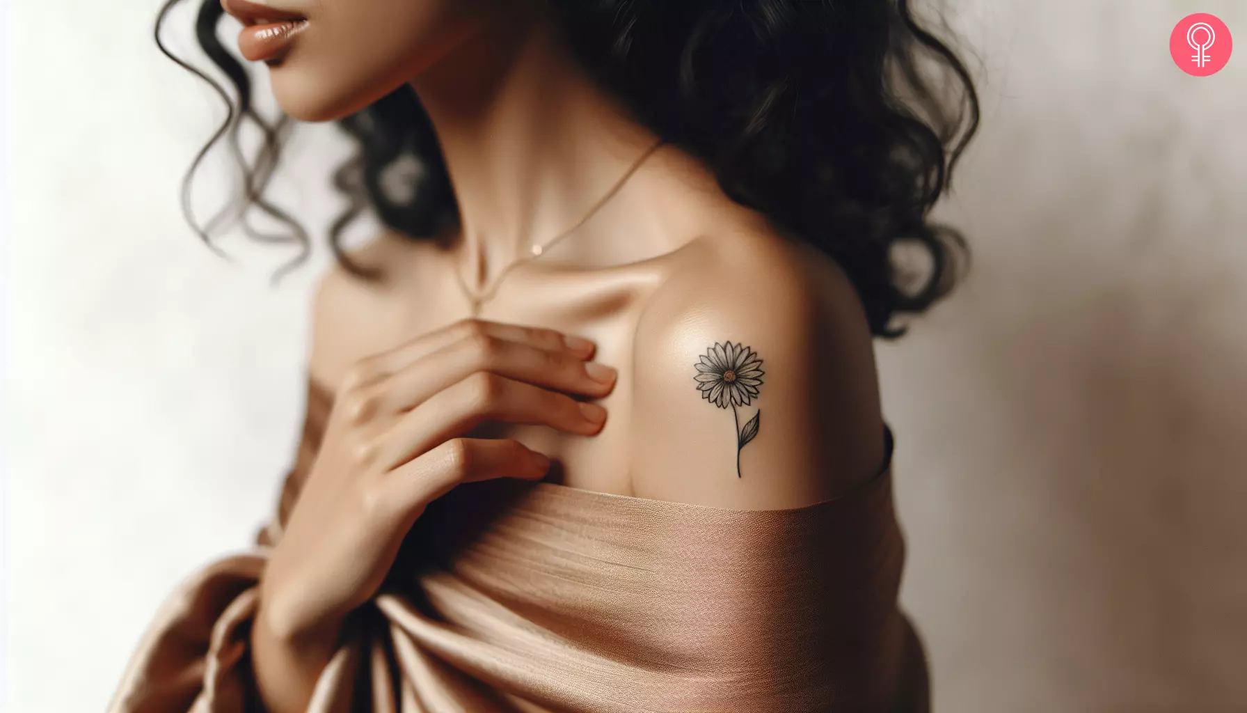 Woman with a daisy fine line tattoo