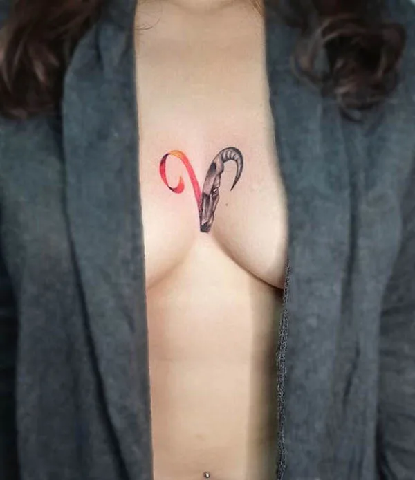 Aries glyph between the boobs by @agthaw.at_