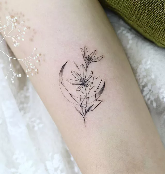 saffron and moon tattoo