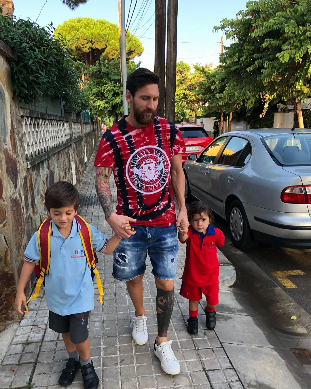 Messi was on dad duties with his two youngsters in Barcelona