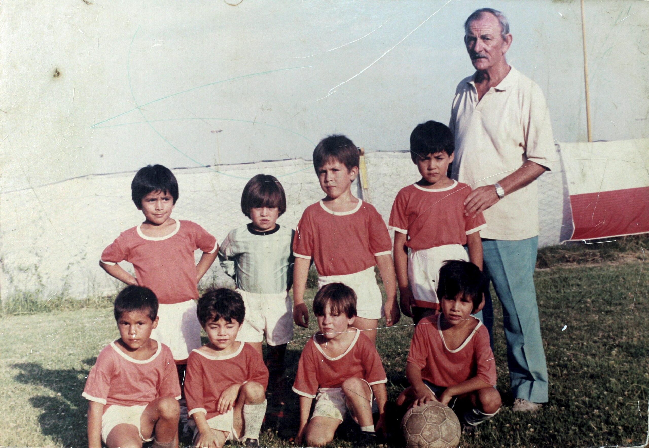 Messi, second from right on the front row, as a four-year-old playing for youth side Grandoli in Argentina