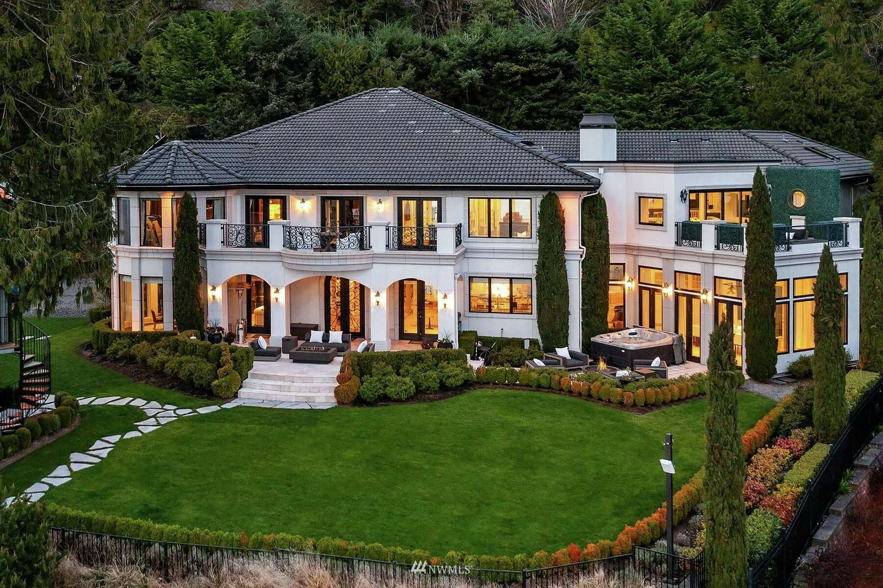 Seattle celebs Russell Wilson and Ciara put their massive Bellevue mansion on the market for a whopping $36M.