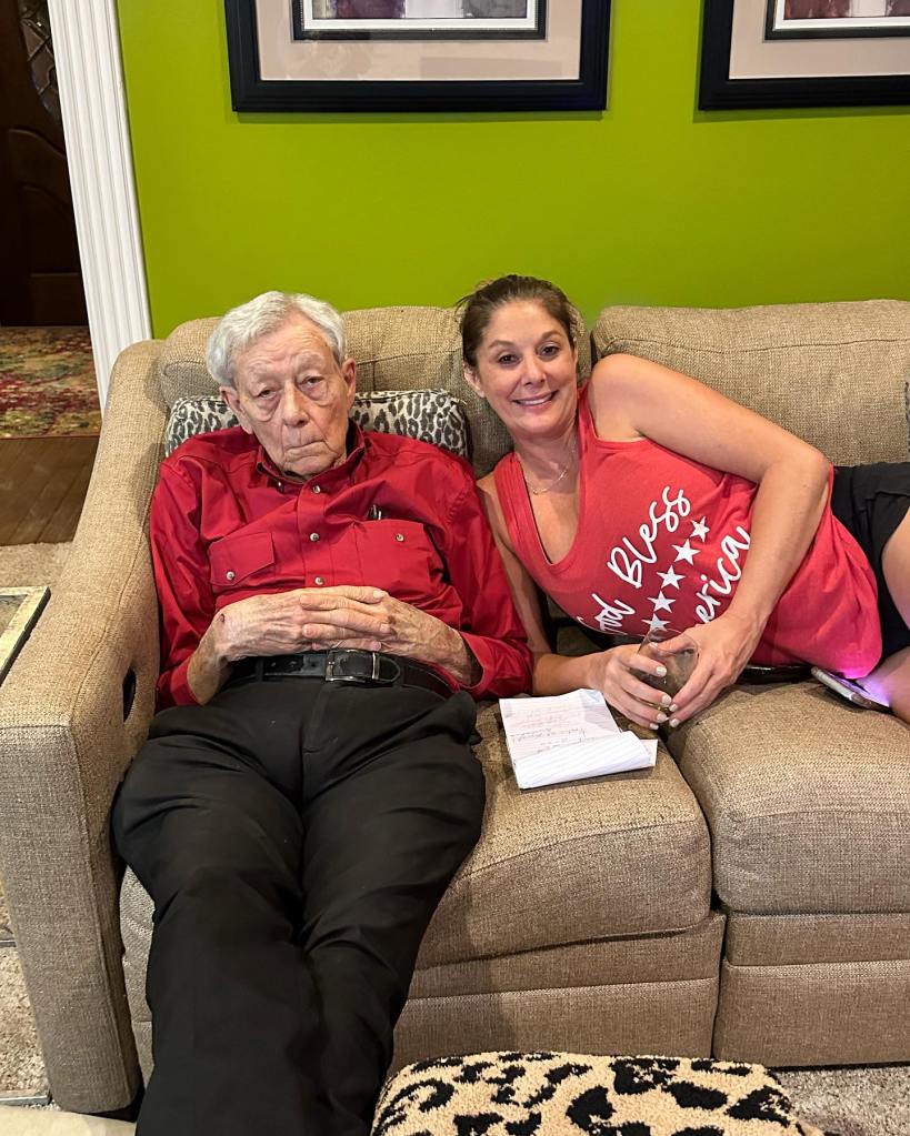 Patrick Mahomes' mom and grandfather pose in a picture together.