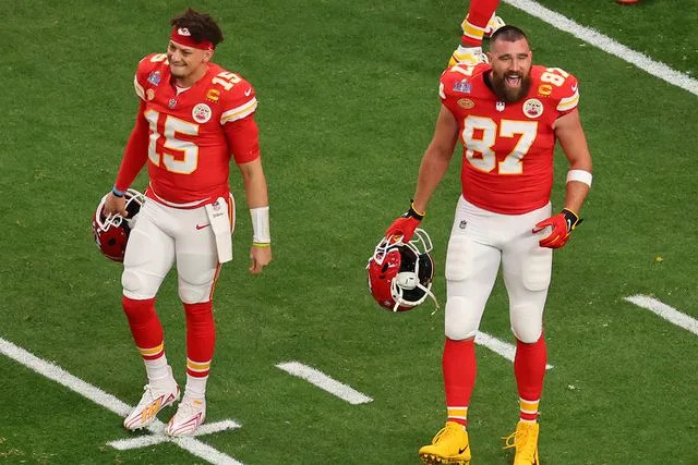 Michael Reaves/Getty Patrick Mahomes and Travis Kelce react before Super Bowl LVIII against the San Francisco 49ers at Allegiant Stadium on February 11, 2024