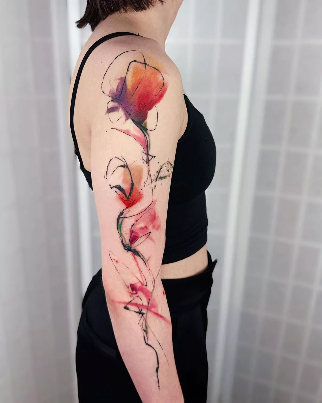 Minimalist Sleeve Watercolor Tattoos