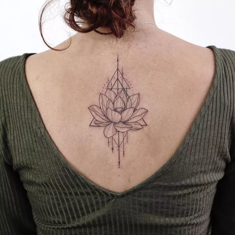A triangle lotus flower tattoo