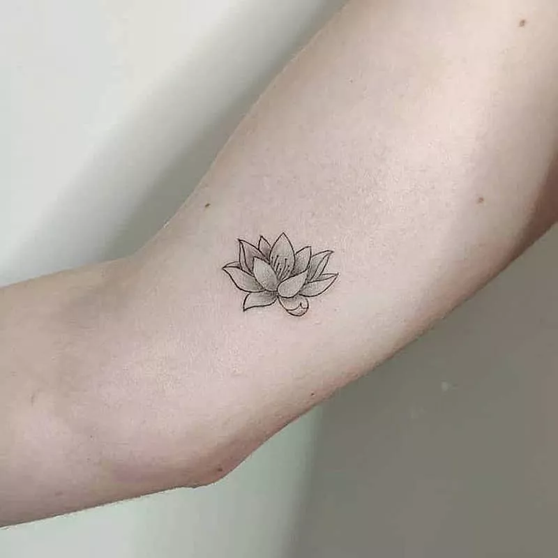 A realistic lotus flower tattoo